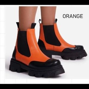 Step up your style with our Tangy Orange Chelsea Boots!
